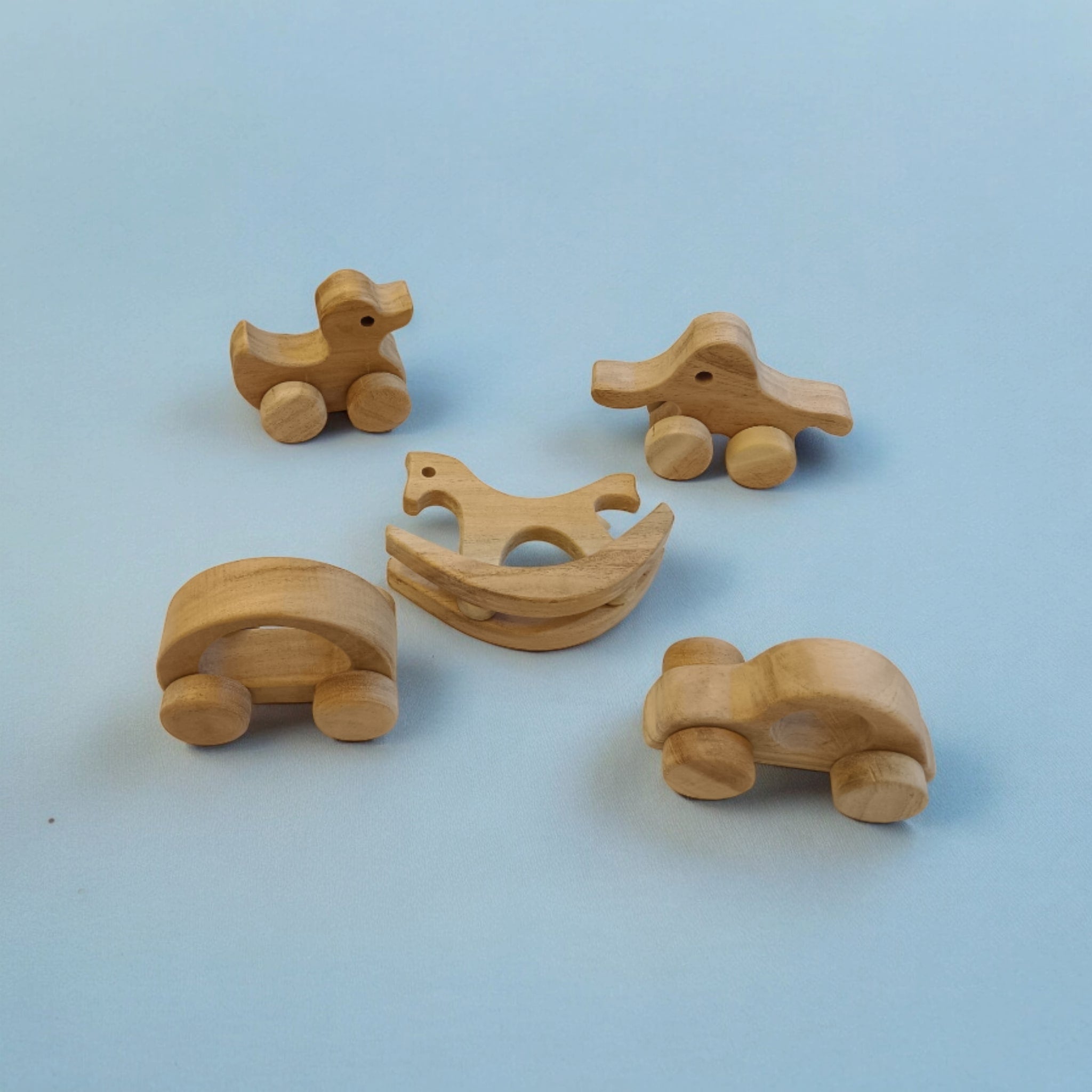 Neem Wooden Swing Horse & Wheel Toys Set of 5 | Baby Play Combo – Wooden Toys on Brown Living™. SKU: SW_SHRS-ELP-HCR-DK-CR. Img 1.