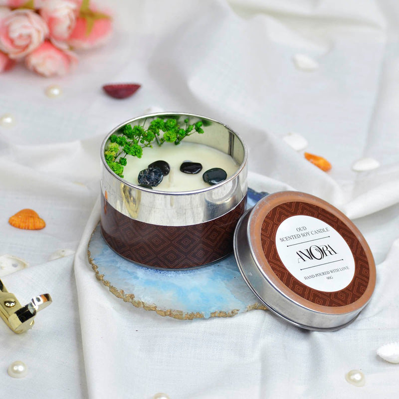 Oud Scented Soy Wax Candle in Tin with Flowers and Stones | Verified Sustainable Candles & Fragrances on Brown Living™