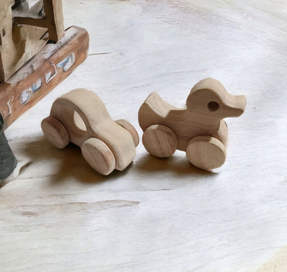 Pack Of 2 Neem Wooden Wheel Toys – Car & Duck Shapes For Toddlers – Toy Trains & Vehicles on Brown Living™. SKU: W_CR-DK. Img 1.