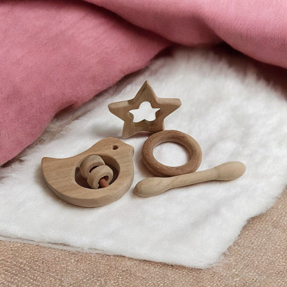 Pain Relieving Baby Rattle & Teethers Set – Wooden Toys on Brown Living™. SKU: RT_DV-DBL-STR-RNG. Img 1.