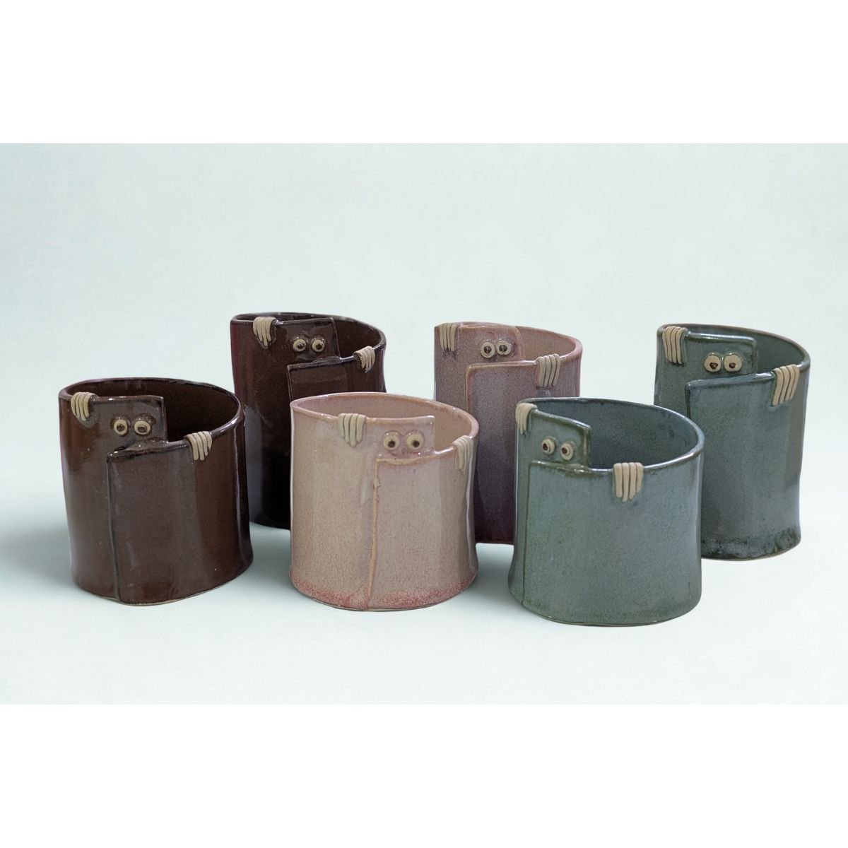 Peek - a - Boo Ceramic Organizer: Adorable Storage Solution – Home Decor by Solar Crafts available on Brown Living™. Peach Small. SKU: PAB - SM - Peach. Img 1.