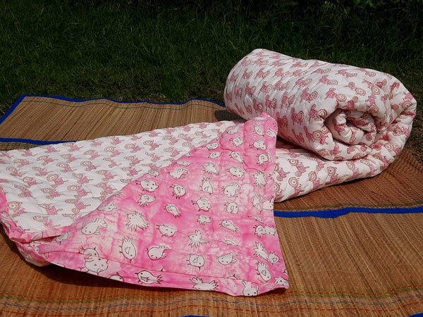 Pink & White Kids Quilt- Tractor & Bird Design | Verified Sustainable Bed Linens on Brown Living™