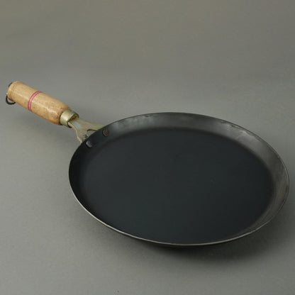 Pure Iron Handmade Dosa Tawa (10inches Inches)+ Free Wooden Flip – Cookware by 80s Cookware available on Brown Living™. . SKU: Iron - Tawa - 1 - 1600g - packof1. Img 4.