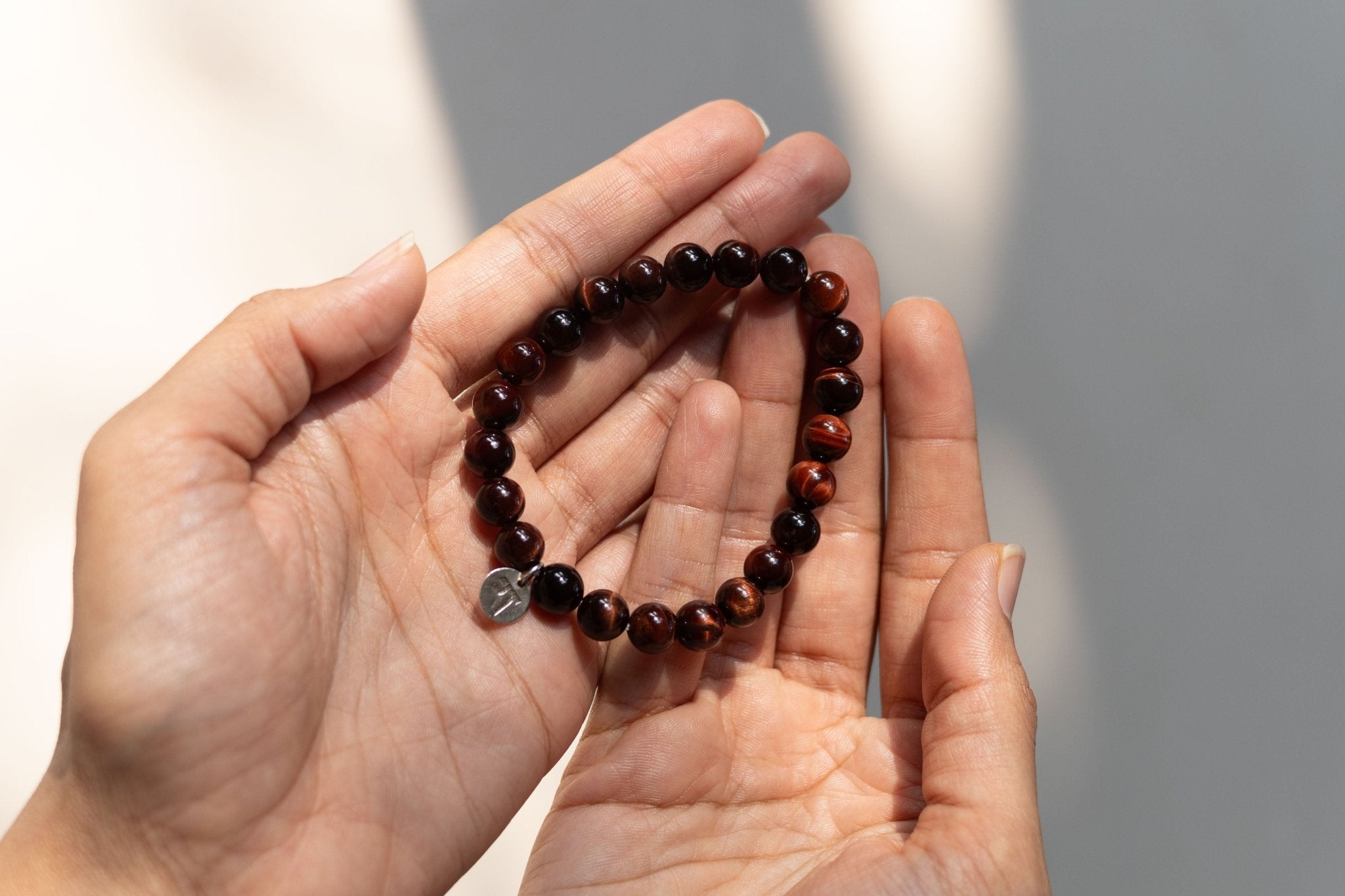 Red Tiger’s Eye Bracelet | Handmade Healing Crystal Jewelry – Womens Bracelets by Rā The Studio available on Brown Living™. . SKU: RA - BR - RTE - 01. Img 1.