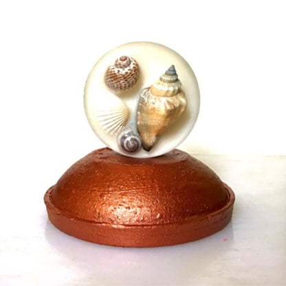 Reusable Seashell Textured Wax Tablet (Round) | Fragranced Wax Tablet – Candles & Fragrances on Brown Living™. SKU: SSWXTBSLCNV1. Img 1.