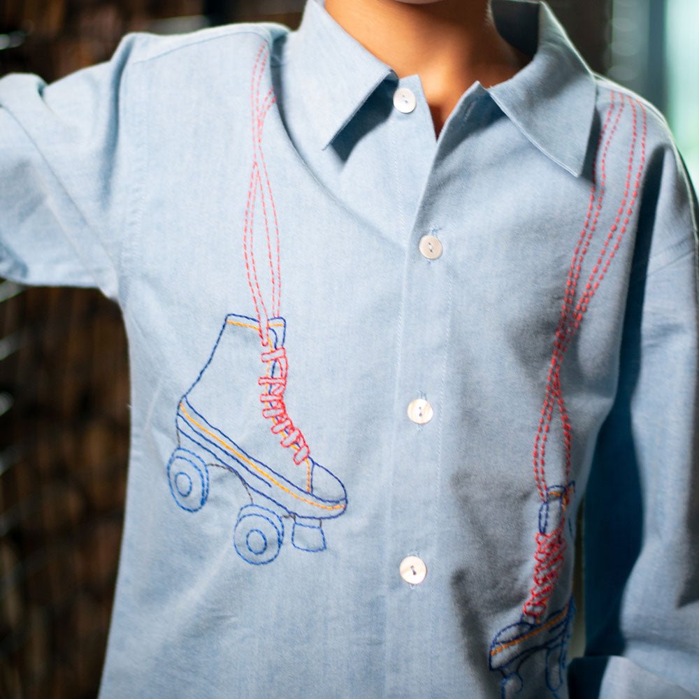 Roller Skates Embroidered Denim Shirt - Blue – Mens Shirt by Nanhey available on Brown Living™. 12 - 18m . SKU: NANFS006EMB050 - 18M. Img 2.