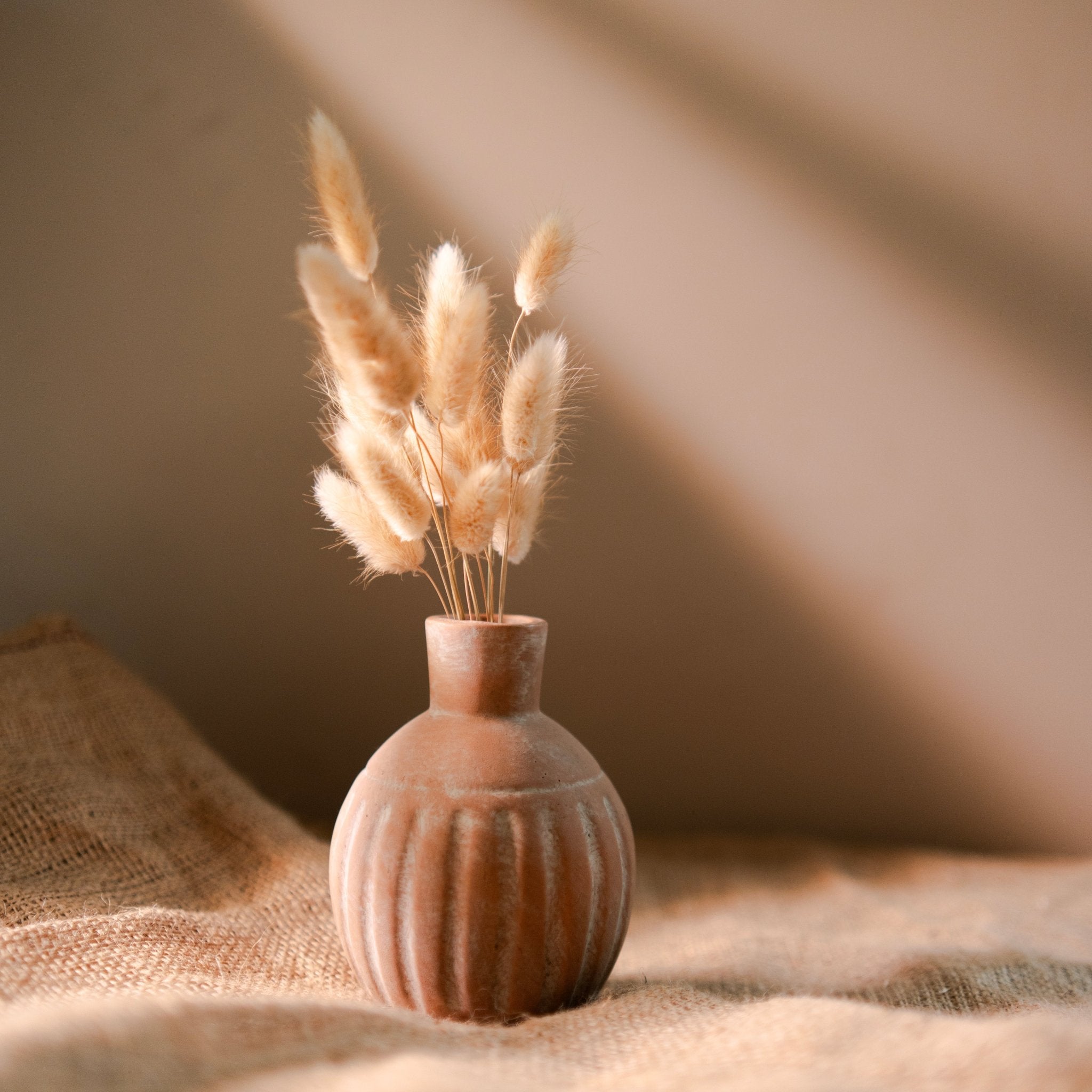 Rustic Ceramic Vase with Natural Bunny Tail Grass – Gift Hampers on Brown Living™. SKU: V-380. Img 1.