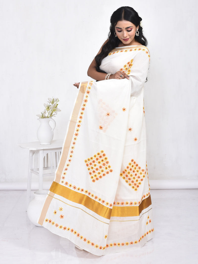 White Kerala Cotton Saree with Floral Hand Embroidery and Zari Border