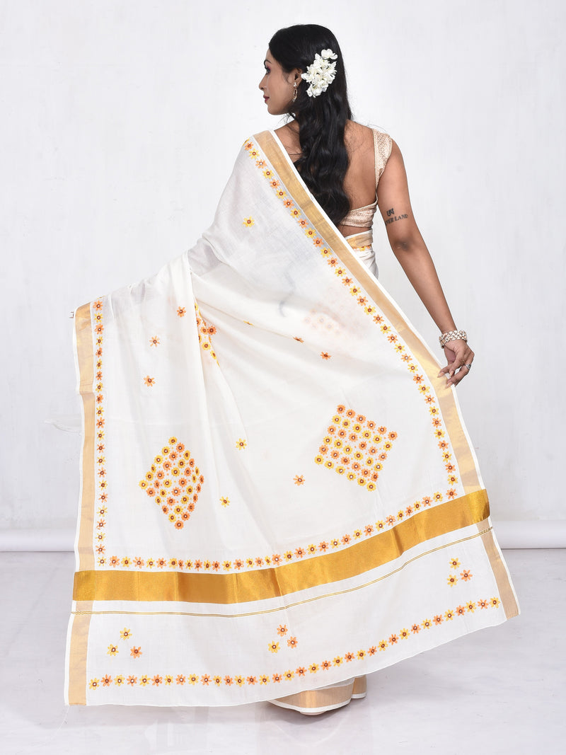 White Kerala Cotton Saree with Floral Hand Embroidery and Zari Border