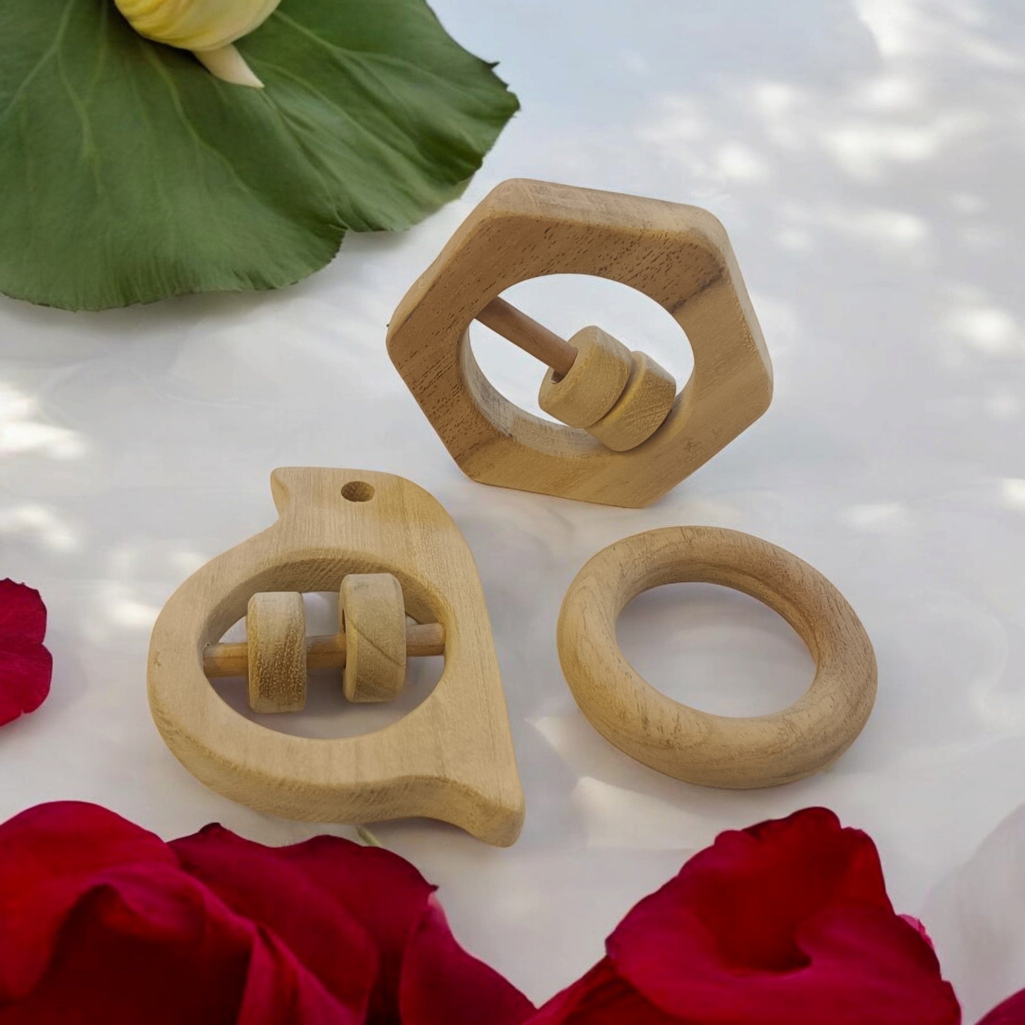 Sensory Developing Rattles & Teether Made From Pure Neem Wood – Wooden Toys on Brown Living™. SKU: RT_SPR-HXN-RNG. Img 1.