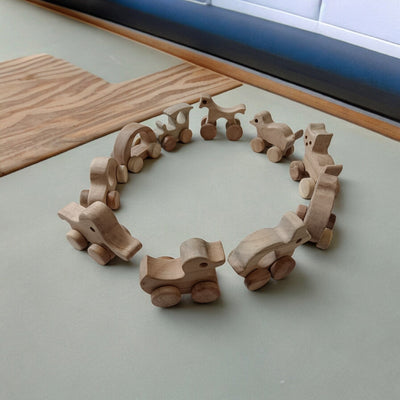 Set Of 10 Beautiful Push & Pull Toys For Toddlers – Toy Trains & Vehicles on Brown Living™. SKU: W_SET10. Img 4.