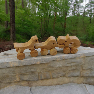 Set Of 3 Jungle Animal Neem Wooden Wheel Toys For Toddlers – Toy Trains & Vehicles on Brown Living™. SKU: W_HRS-ELP-HPO. Img 1.