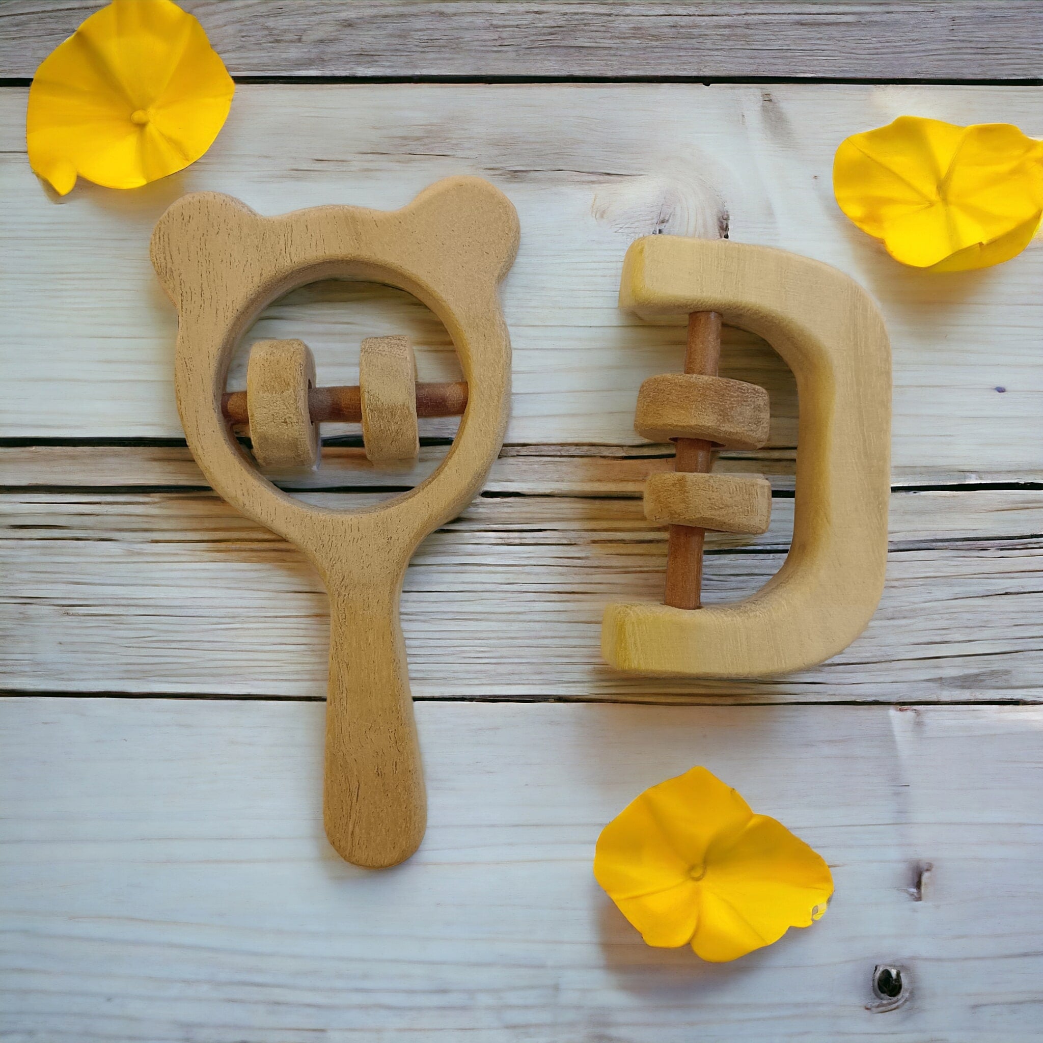Soothing Sound Making Set Of 2 Neem Wooden Rattles For Toddlers – Baby Rattles on Brown Living™. SKU: R_MKHD-C. Img 1.