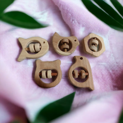 Soundmaking Rattles – Sparrow, Dove, Fish, Hippo & Hexagon Shapes – Baby Rattles on Brown Living™. SKU: R_SET5. Img 3.