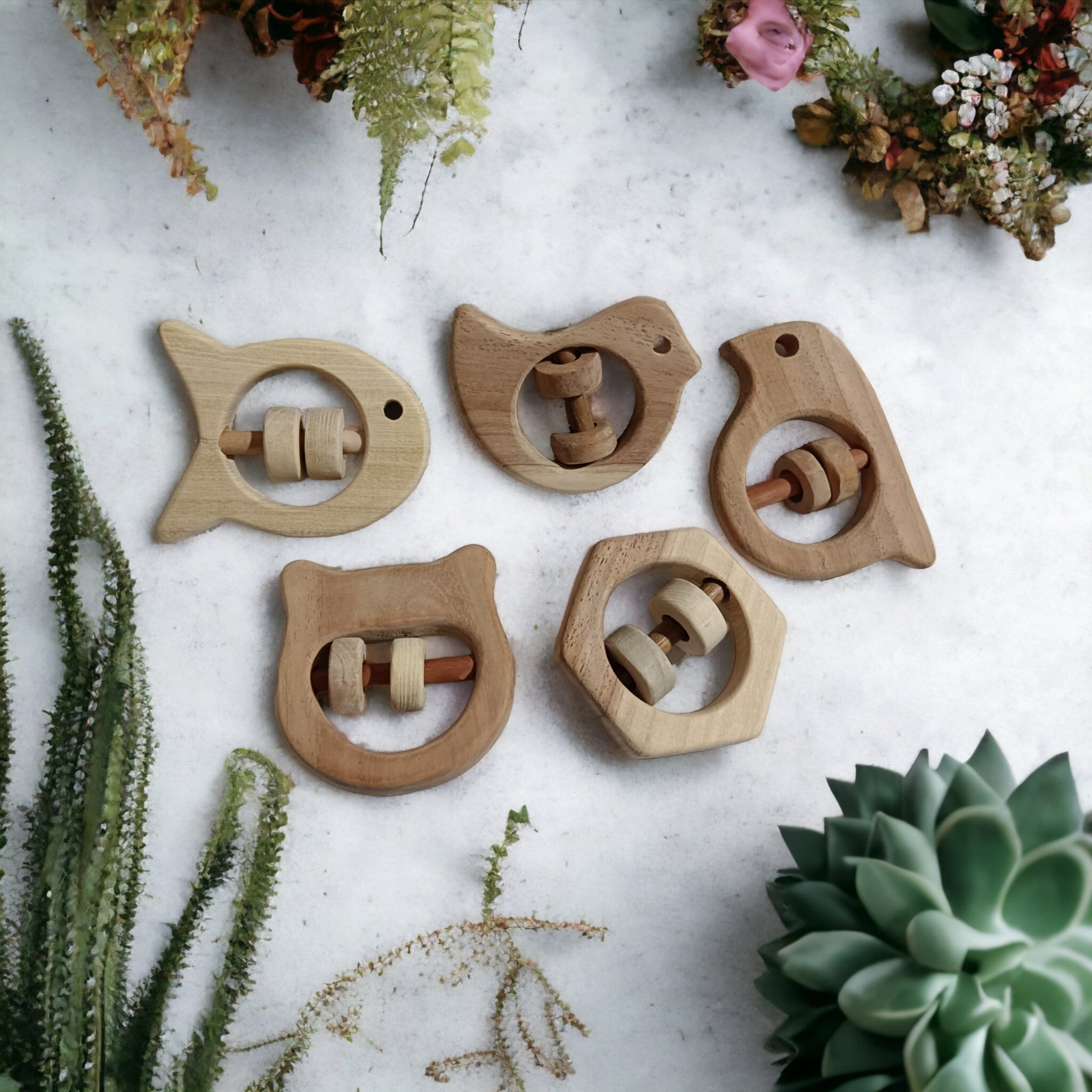 Soundmaking Rattles – Sparrow, Dove, Fish, Hippo & Hexagon Shapes – Baby Rattles on Brown Living™. SKU: R_SET5. Img 9.