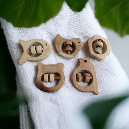 Soundmaking Rattles – Sparrow, Dove, Fish, Hippo & Hexagon Shapes – Baby Rattles on Brown Living™. SKU: R_SET5. Img 4.