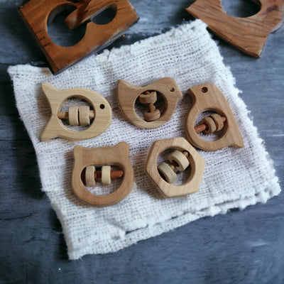 Soundmaking Rattles – Sparrow, Dove, Fish, Hippo & Hexagon Shapes – Baby Rattles on Brown Living™. SKU: R_SET5. Img 8.