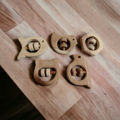 Soundmaking Rattles – Sparrow, Dove, Fish, Hippo & Hexagon Shapes – Baby Rattles on Brown Living™. SKU: R_SET5. Img 2.