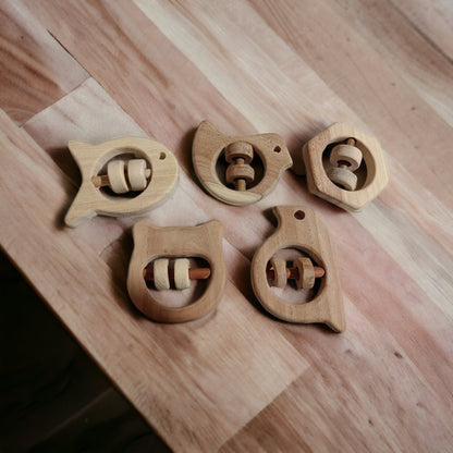 Soundmaking Rattles – Sparrow, Dove, Fish, Hippo & Hexagon Shapes – Baby Rattles on Brown Living™. SKU: R_SET5. Img 2.