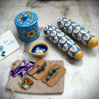 Sustainable Blue Pottery Luxury Rakhi Gift Hamper – Rakhi by Terracotta by Sachii available on Brown Living™. . SKU: SACHIIRLH003. Img 1.