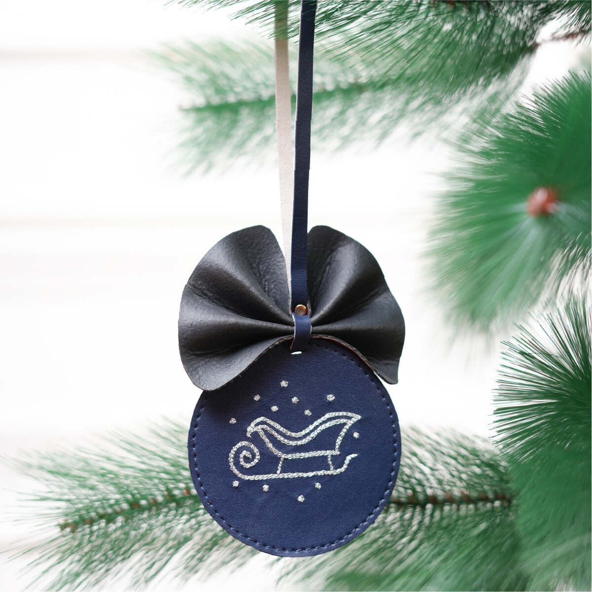 Cactus Leather Festive Decor Handcrafted Christmas Sleigh Bulb (Blue) – Decor & Artefacts on Brown Living™. SKU: XMGH1001. Img 1.