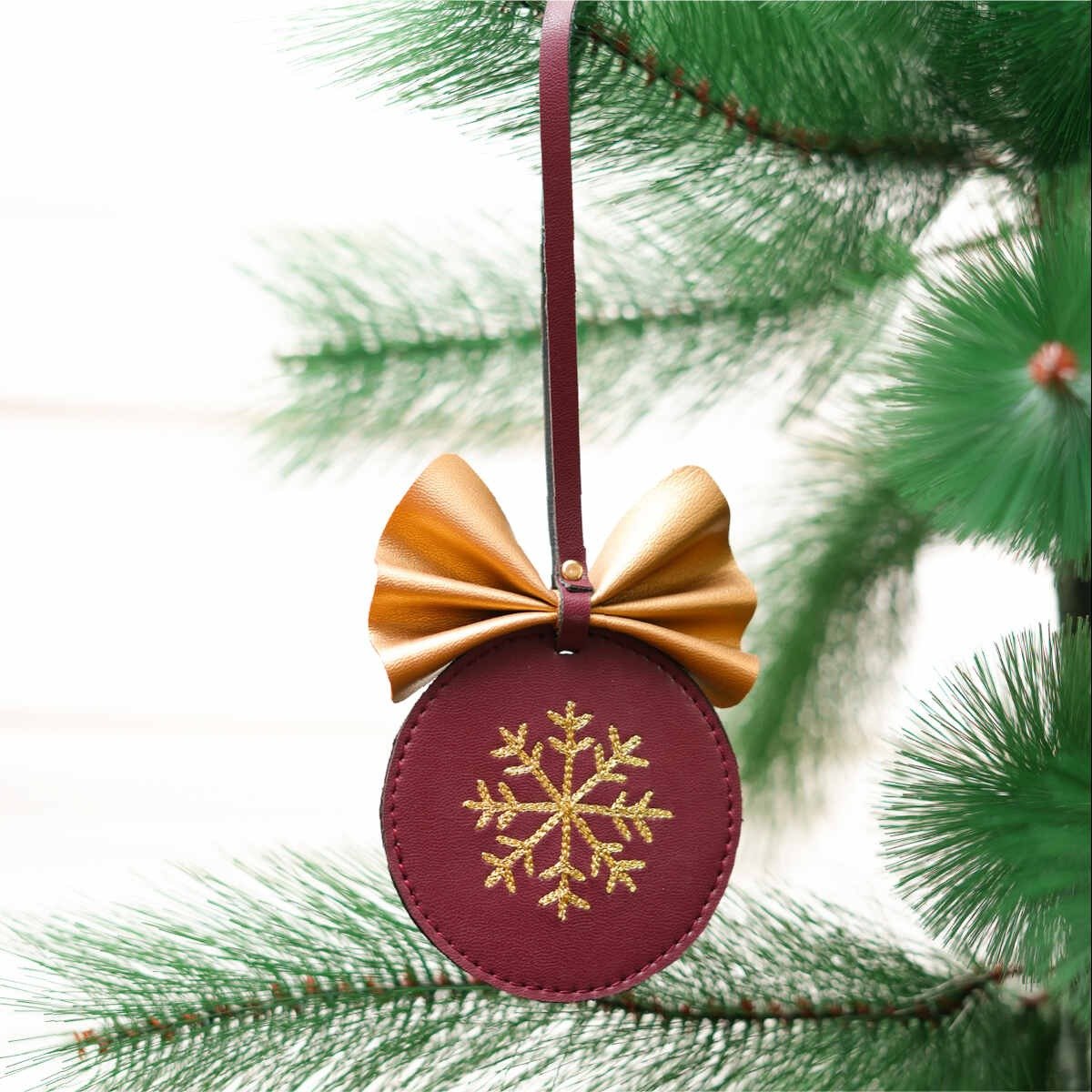 Cactus Leather Festive Decor Handcrafted Christmas Snowflake Bulb (Maroon) – Decor & Artefacts on Brown Living™. SKU: XMGH1002. Img 1.