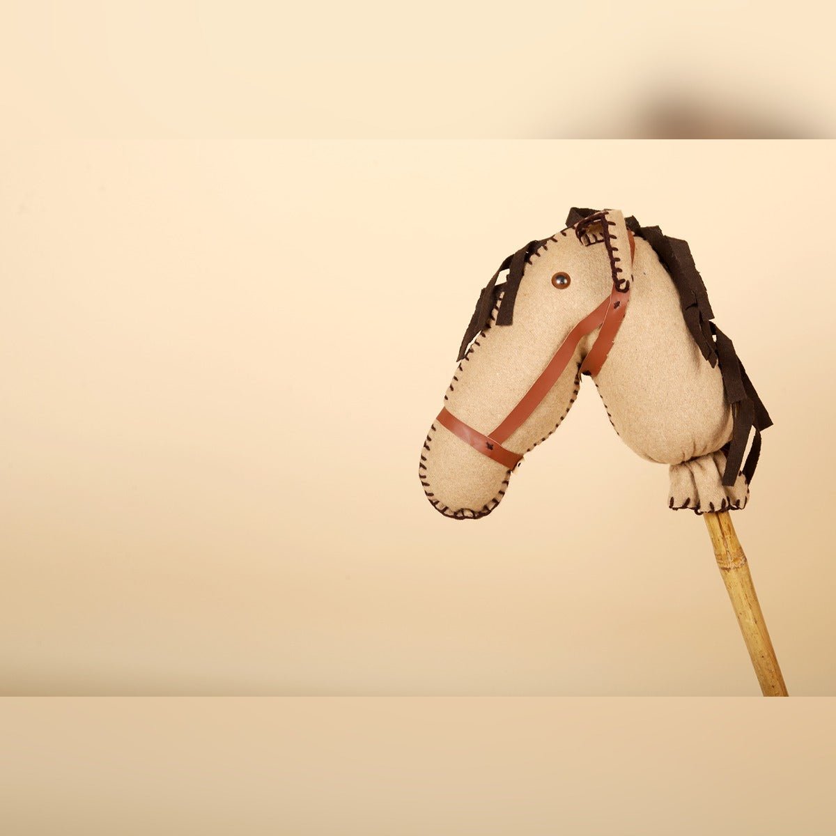 Caramel Brown Hobby Horse – Wooden Stick Toy – Role & Pretend Play Toys by Bombay Toy Company available on Brown Living™. . SKU: HH02B. Img 2.