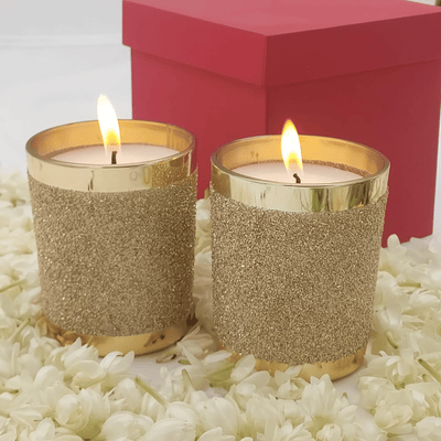 Golden Glass Candles with Shimmer Finish - Set of 2 – Candles & Fragrances on Brown Living™. SKU: SND2415. Img 1.
