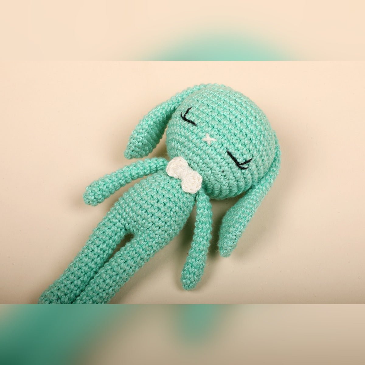 Green Bunny Crochet Baby Doll – Newborn Cuddle Toy – Dolls & Dollhouses by Bombay Toy Company available on Brown Living™. . SKU: CBD01GR. Img 2.
