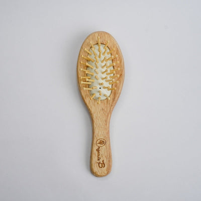Junior Tangle Tamer Teak Wood Paddle Hair Brush for Kids – Hair Brush on Brown Living™. SKU: PC_HA_WB_ OSHK. Img 1.