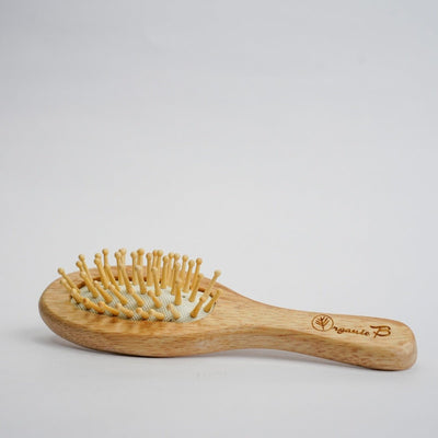 Junior Tangle Tamer Teak Wood Paddle Hair Brush for Kids – Hair Brush on Brown Living™. SKU: PC_HA_WB_ OSHK. Img 4.