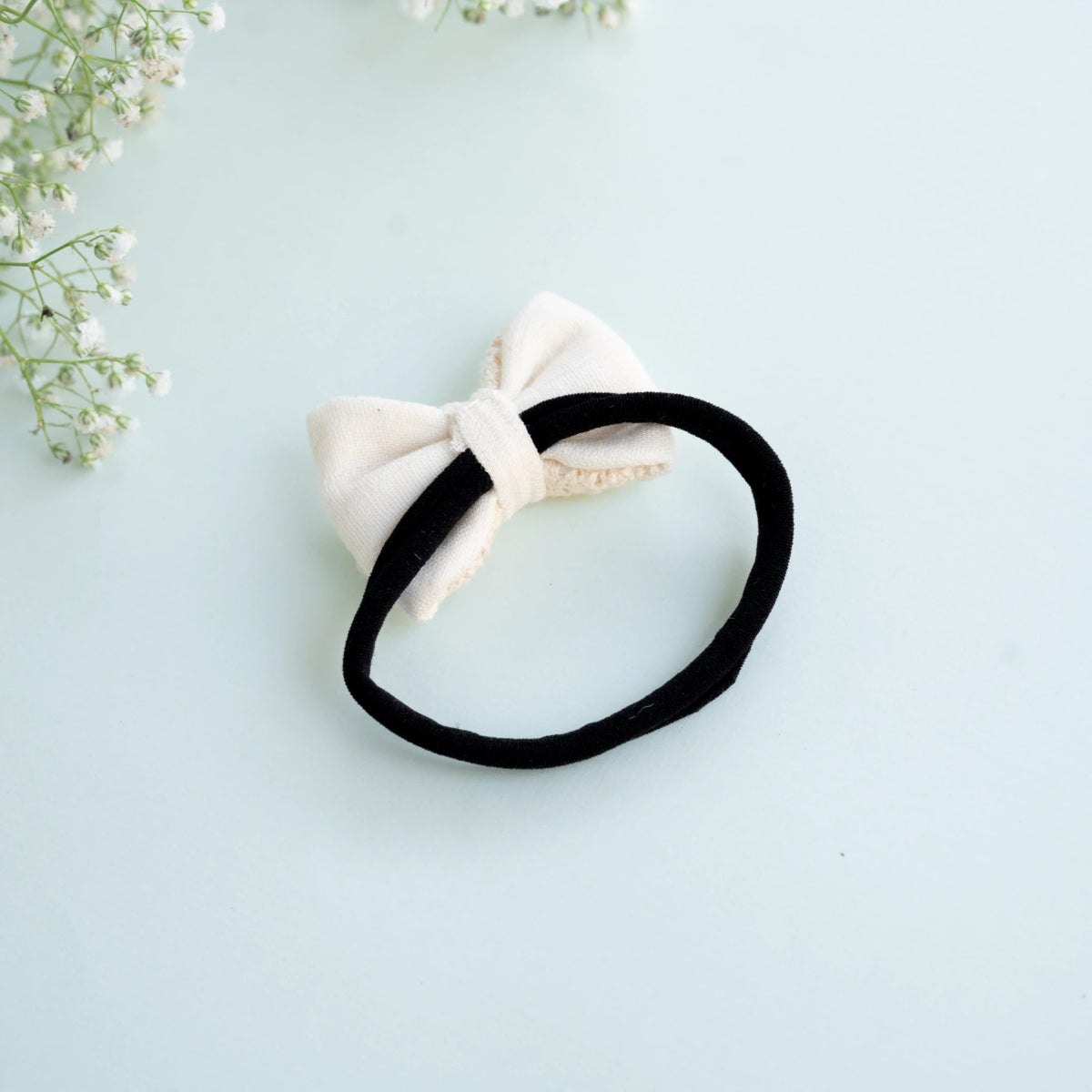 Newborn Mini Lace Hair Bow | Off White | Verified Sustainable by Brown Living™