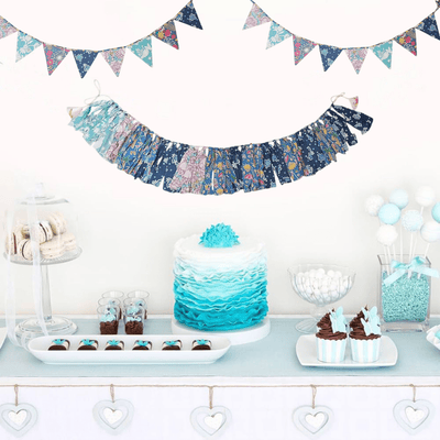 Party Blue Streamer Combo - Blue Banner Bunting + Blue Fringe Streamer Garland (Pack of 2) – Wall Decor on Brown Living™. SKU: UMW - COMBO - BUNT - Blue - 01. Img 1.