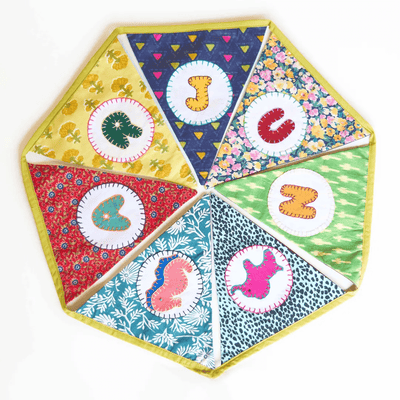 Personalized Name Banner with Animal Motifs (Triangle Flag) – Wall Decor on Brown Living™. SKU: UMW - BUNTING - PRSN - ANML - 01. Img 1.