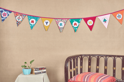 Personalized Name Banner with Cupcake & Flower Motifs (Triangle Flag) – Wall Decor on Brown Living™. SKU: UMW - BUNTING - CPCKFLR - 01. Img 2.