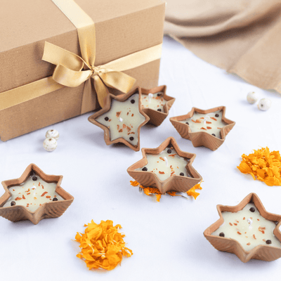 Star Teracotta / Mitti Diyas with Kesar Chandan Aroma - Set of 6 – Candles & Fragrances on Brown Living™. SKU: SN2545. Img 1.
