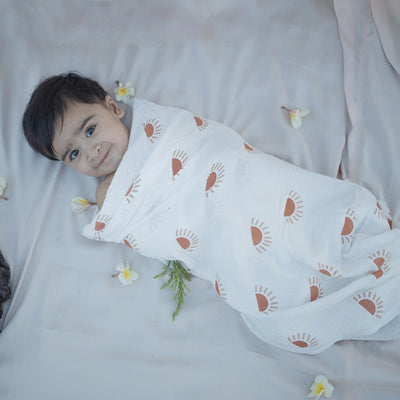 Sunburst Organic Baby Swaddle – Little Cocoon Wrap – Baby Swaddle on Brown Living™. SKU: MM - 01 - 0003. Img 1.