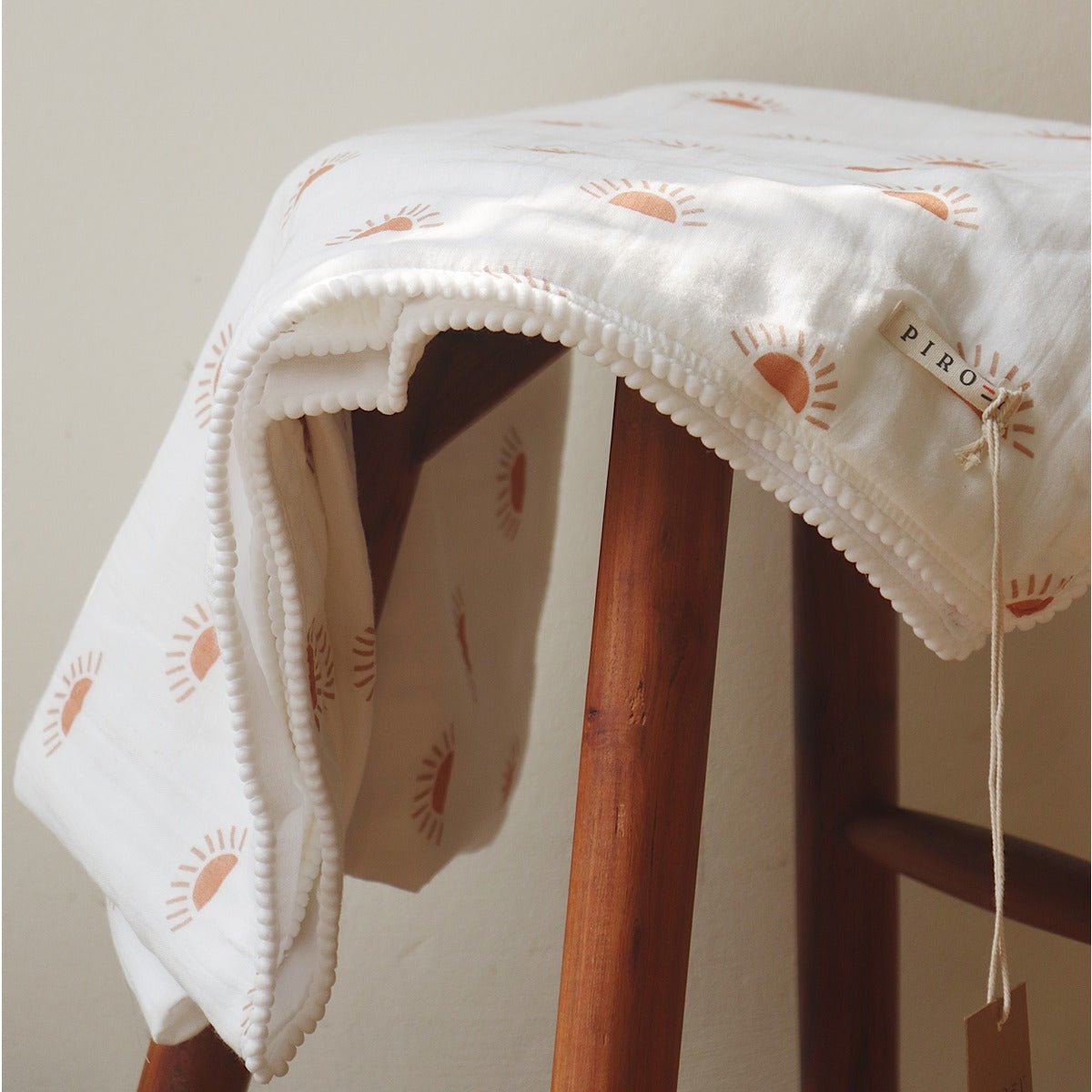 Sunburst Pom Pom Blanket – All Season Organic Baby Blanket | Verified Sustainable by Brown Living™