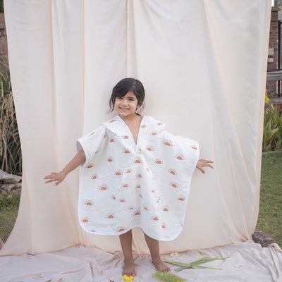 Sunburst Poncho Style Baby Bath Towel – Organic Cotton – Bath Accessories on Brown Living™. SKU: MM - 01 - 0006. Img 1.