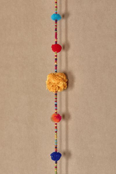Upcycled Beaded Pom - Pom Festive Decoration String – Wall Decor on Brown Living™. SKU: UMW - BEAD - STRING - 01. Img 6.