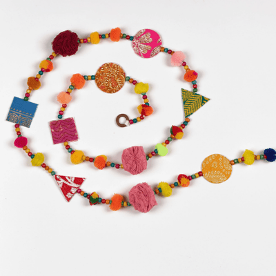 Upcycled Chintzy Pom - Pom Festive Decoration String – Wall Decor on Brown Living™. SKU: UMW - CHINTZY - STRING - 01. Img 1.