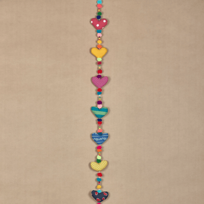 Upcycled Hearty Pom Pom String – Wall Decor on Brown Living™. SKU: UMW - HEART - STRING - 01. Img 1.