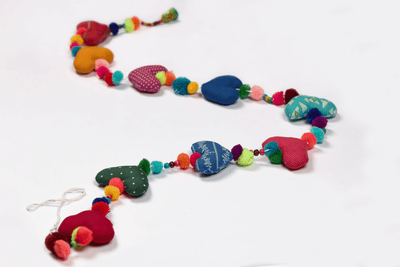 Upcycled Hearty Pom Pom String – Wall Decor on Brown Living™. SKU: UMW - HEART - STRING - 01. Img 6.