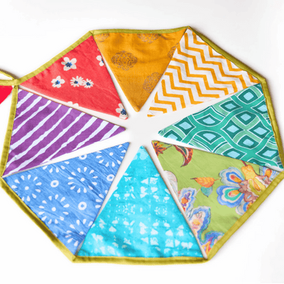 Upcycled Rainbow Bunting – Wall Decor on Brown Living™. SKU: UMW - BUNTING - PRN - 01. Img 1.