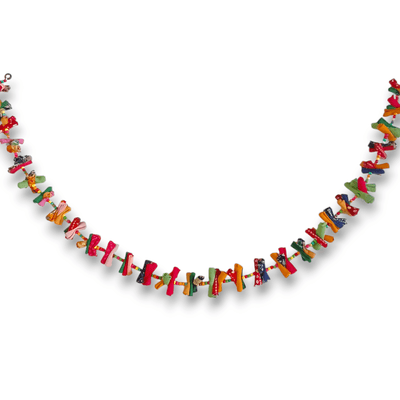 Upcycled Rainbow Rolly Molly String - Party Streamer – Wall Decor on Brown Living™. SKU: UMW - ROLLY - STRING - 01. Img 1.