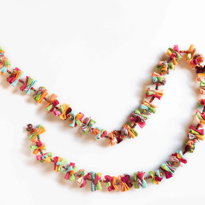 Upcycled Rainbow Rolly Molly String - Party Streamer – Wall Decor on Brown Living™. SKU: UMW - ROLLY - STRING - 01. Img 7.