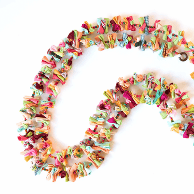 Upcycled Rainbow Rolly Molly String - Party Streamer – Wall Decor on Brown Living™. SKU: UMW - ROLLY - STRING - 01. Img 3.