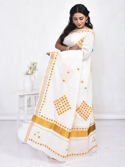 White Kerala Cotton Saree with Floral Hand Embroidery and Zari Border | Verified Sustainable by Brown Living™