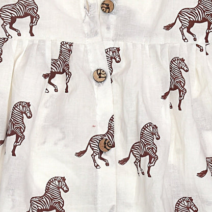 White Printed Cotton Baby Dress with Zebra Design