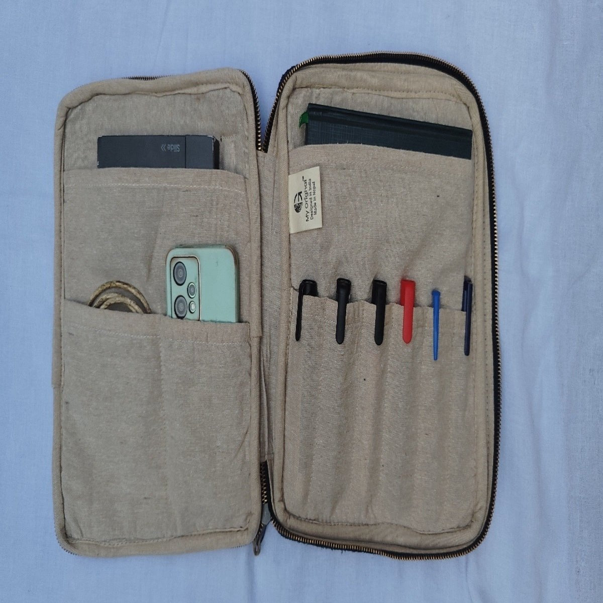 Taro iPad Sling Bag | Compact Everyday Crossbody Bag – Sling Bag on Brown Living™. SKU: OGSBIP01white. Img 2.